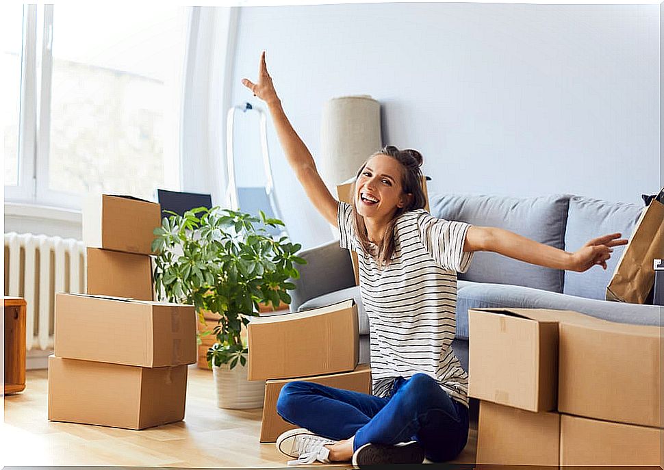 Woman surrounded by boxes