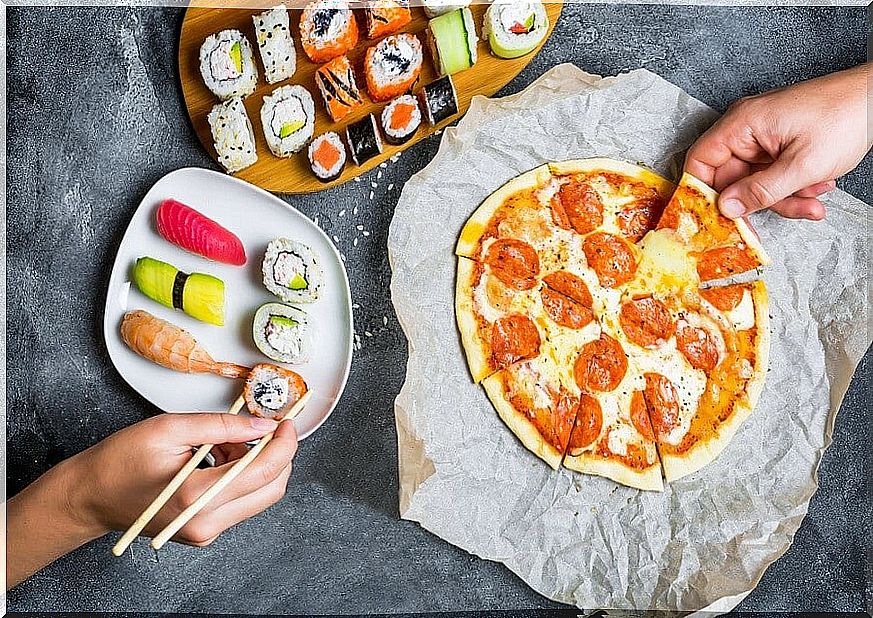 Avocado and fresh tomato pizza in skillet