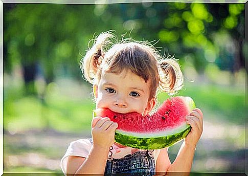 girl eating watermelon